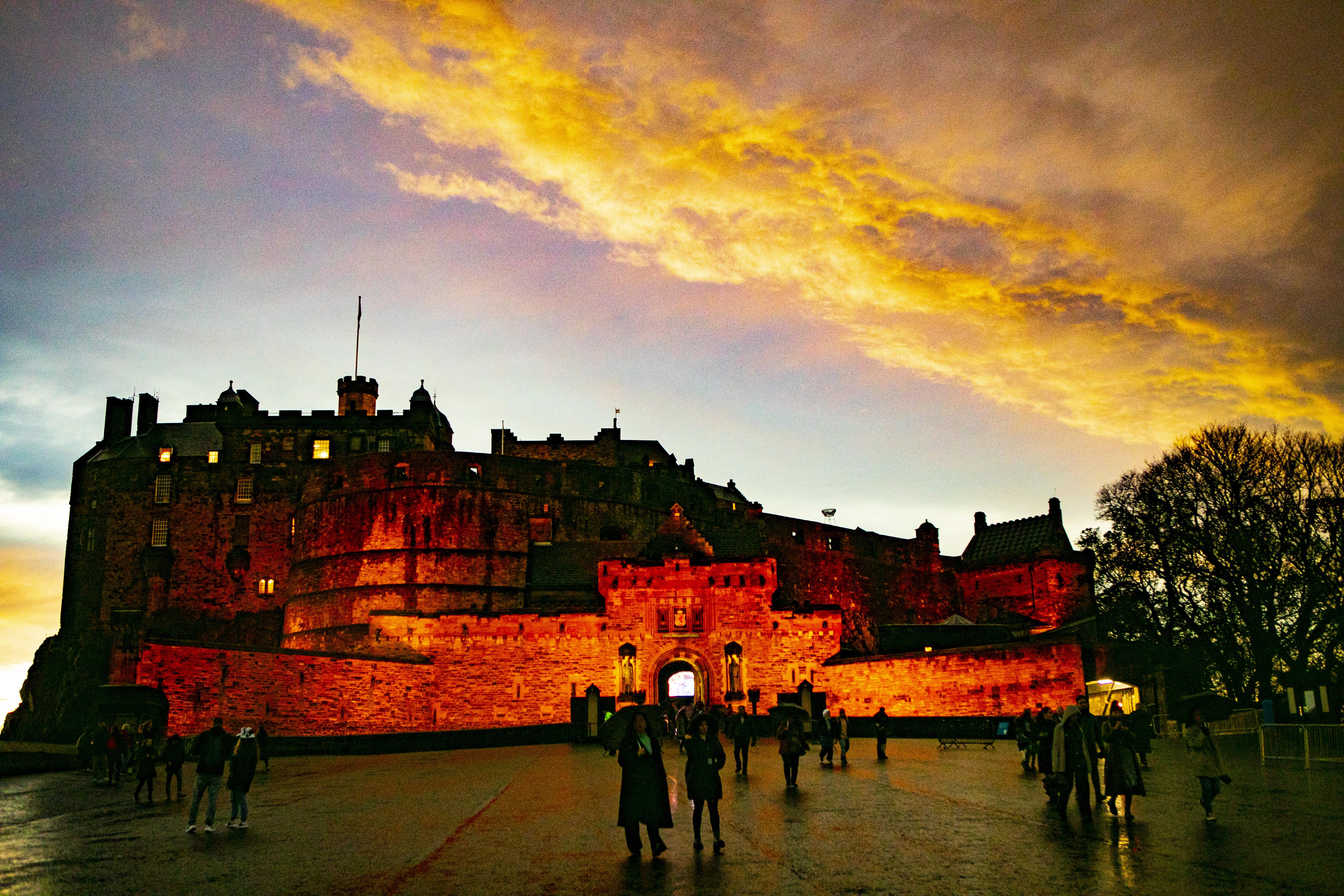 Edinburgh castle from parade ground sunset and tourists